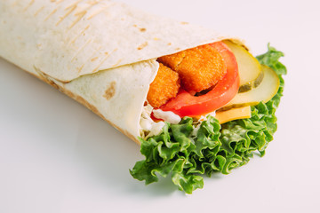 tortilla wraps with snack and vegetables
