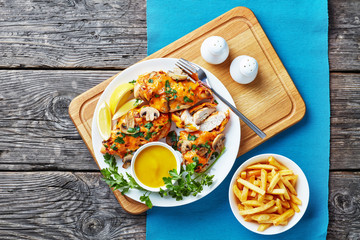 Aussie Chicken breasts topped with melted cheese