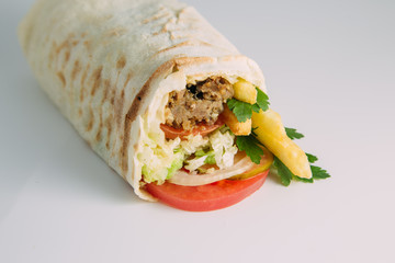 tortilla wraps with meat and vegetables