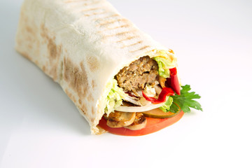 tortilla wraps with meat and vegetables