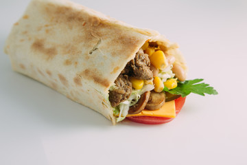tortilla wraps with meat and vegetables