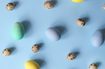 Lots of colorful and different sized Easter eggs.