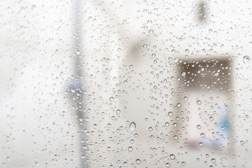 Close-up Drops on Surface of Shower Cabin as Background blurred Image 