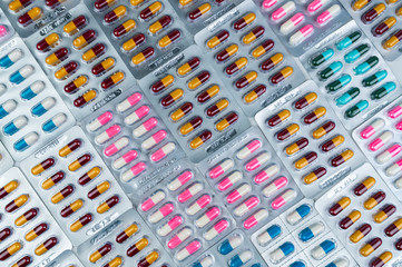 Top view of colorful antibiotic capsule pills in blister pack. Antibiotic drug resistance....