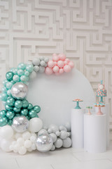 Birthday Part zone with pink silver  turquoise baloons and birthday cake