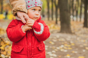 Concept of children life. Lifestyle of child, baby girl at park  