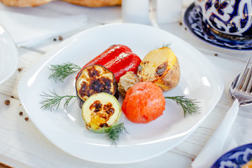 Grilled vegetables - tomatoes, potato, bell pepper, eggplant anc zuccini.
