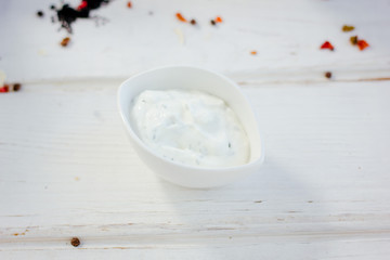 White sauce with herbs.