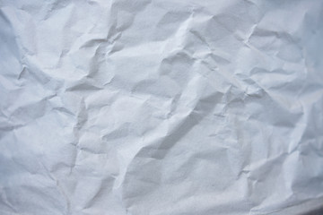 Crumpled white paper background