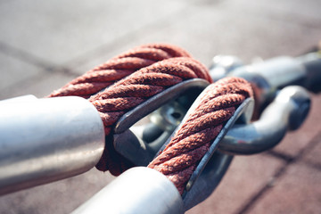 Close up of metal tackle with ropes