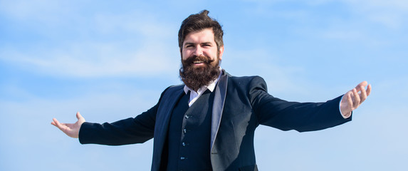 Guy enjoy top achievement. Man bearded proud himself sky background. Superiority and power. Feeling undefeated. Proud of himself. Self proud and narcissistic. Hipster bearded attractive enjoy freedom