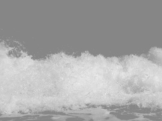 white sea foam from the surf, isolated on a gray background