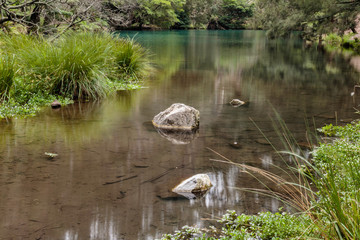 Fototapeta na wymiar The Blue Lake near Jenolan Caves, Blue Mountains National Park, Sydney, Australia during an morning of April 2019