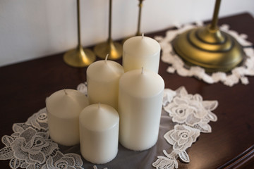 Fototapeta na wymiar Candles on table indoors