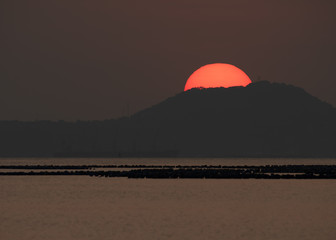 sunset, sun, sea, sky, water, sunrise, landscape, orange, nature, ocean, red, clouds, evening, dusk, mountain, cloud, coast, beach, sunlight, island, yellow, beautiful, silhouette, romantic, lake