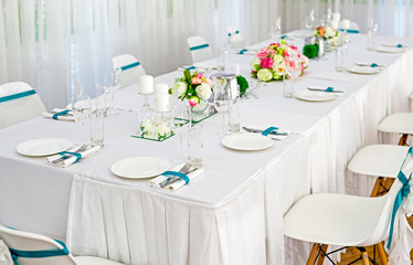 Served tables in restaurants and cafes, meals and drinks on the tables, room design.