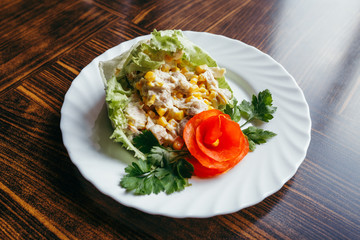 Fresh healthy salad in bowl and ingredients