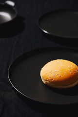 Process making of burger, step by step isolated on black background. Burger wide banner. Split burger. Burger divided in parts