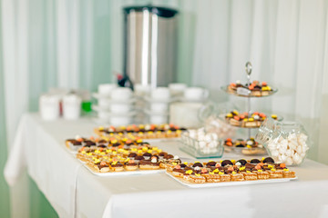 Served tables in restaurants and cafes, meals and drinks on the tables, room design.