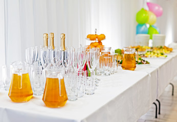 Served tables in restaurants and cafes, meals and drinks on the tables, room design.