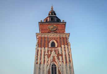 Fototapeta premium Town Hall Tower on a Main Market Square of Old Town in Cracow city in Poland