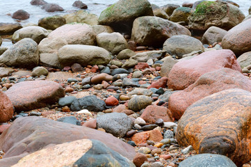 Sea stone texture. Panel texture. Spots gray red background. Background fill. Natural stone background.