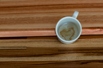 Heart shape inside a cup of coffee. Concept of love. 