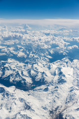 Fototapeta premium Fluffy white clouds, a view from airplane window