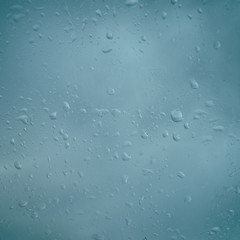 Water drops on glass for background and design