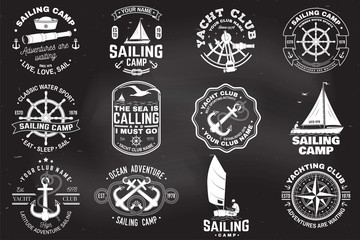 Set of sailing camp and yacht club badge. Vector. Concept for shirt, print or tee. Vintage typography design with black sea anchors, hand wheel, compass and sextant silhouette.