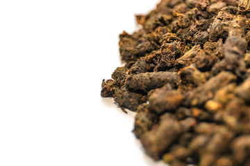 raw granulated tea so close isolated on white