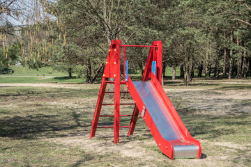 Obraz na płótnie Canvas colorful playground in the park - slide