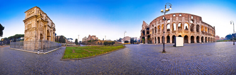 Fototapeta na wymiar Colosseum and Arch of Constantine square panoramic dawn view in Rome