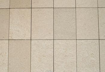 New polished stone cladding on wall closeup