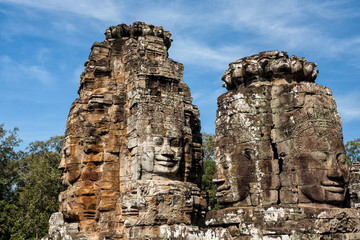 Fototapeta premium The faces are only seen in the Angkor Thom. This big temple is part of the Angkor Wat complex near Siem Reap in Cambodia.