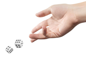 The dice game: hand throwing game cubes, isolated on white background
