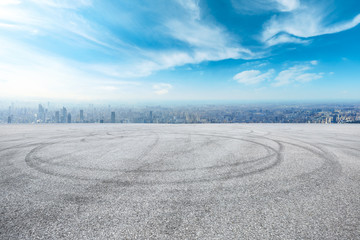 Naklejka premium Shanghai city skyline and asphalt race track ground scenery,high angle view