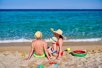 Family on beach in Greece