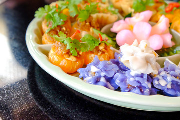 variety of Thai dessert well decorated on ceramic dishes