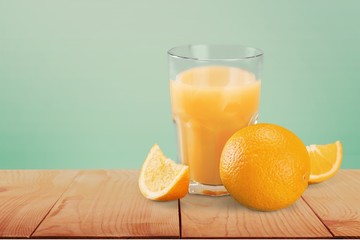 Orange juice and slices of orange on background © BillionPhotos.com