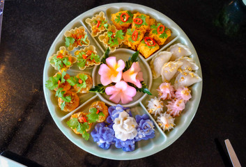 variety of Thai dessert well decorated on ceramic dishes