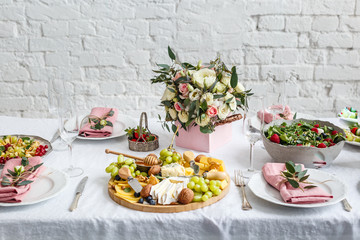 table decoration rose colours white tablecloth flowers fruits cheese