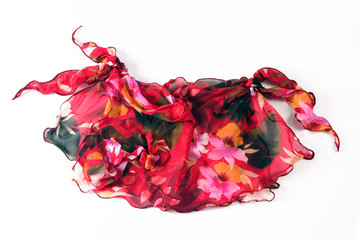 colorful red silk scarf with flowers, isolated on white background