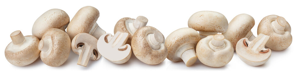 Many fresh champignon mushrooms, isolated on white background