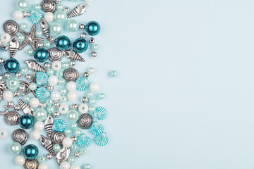 A variety of beads for making necklaces. Copy space