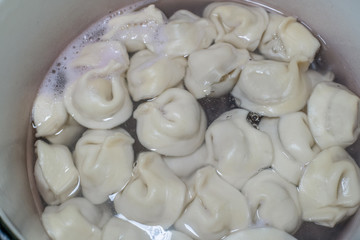 Dumplings are cooked in a pan closeup