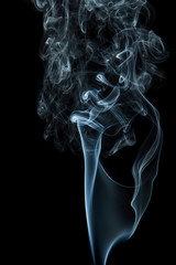 Blue smoke on black background