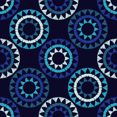 Polka dot seamless pattern. Mosaic of ethnic figures. Sun. Geometric background. Can be used for wallpaper, textile, invitation card, wrapping, web page background.