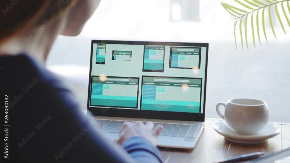 Canvas Prints over the shoulder view of unrecognizable female website designer creating templates for different de