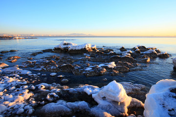 Sunrise by the sea in winter